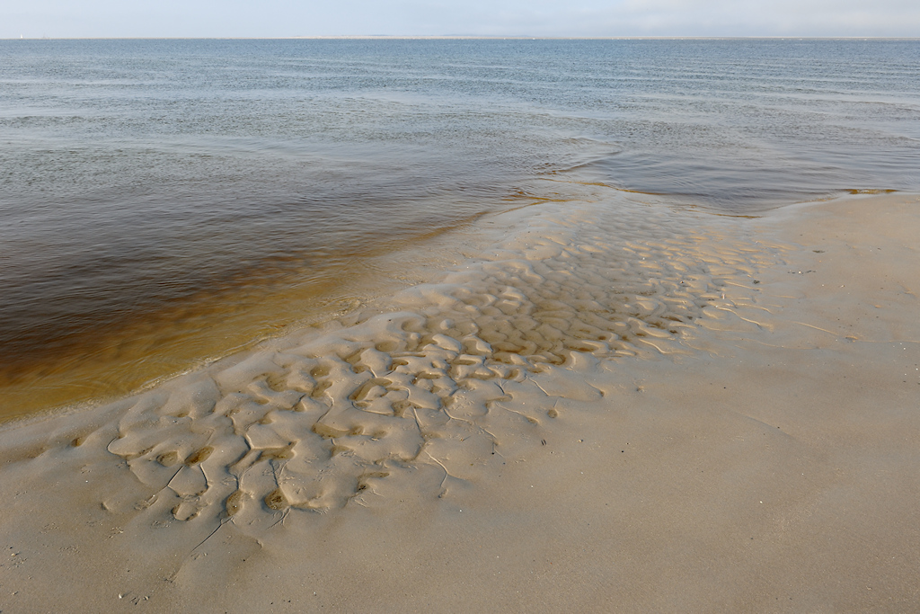 Vloedstroom langs het strand